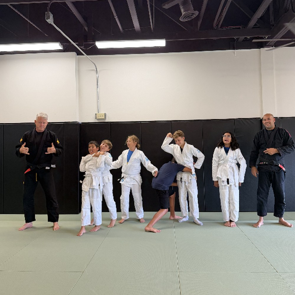 Kids class goofing around with their instructors